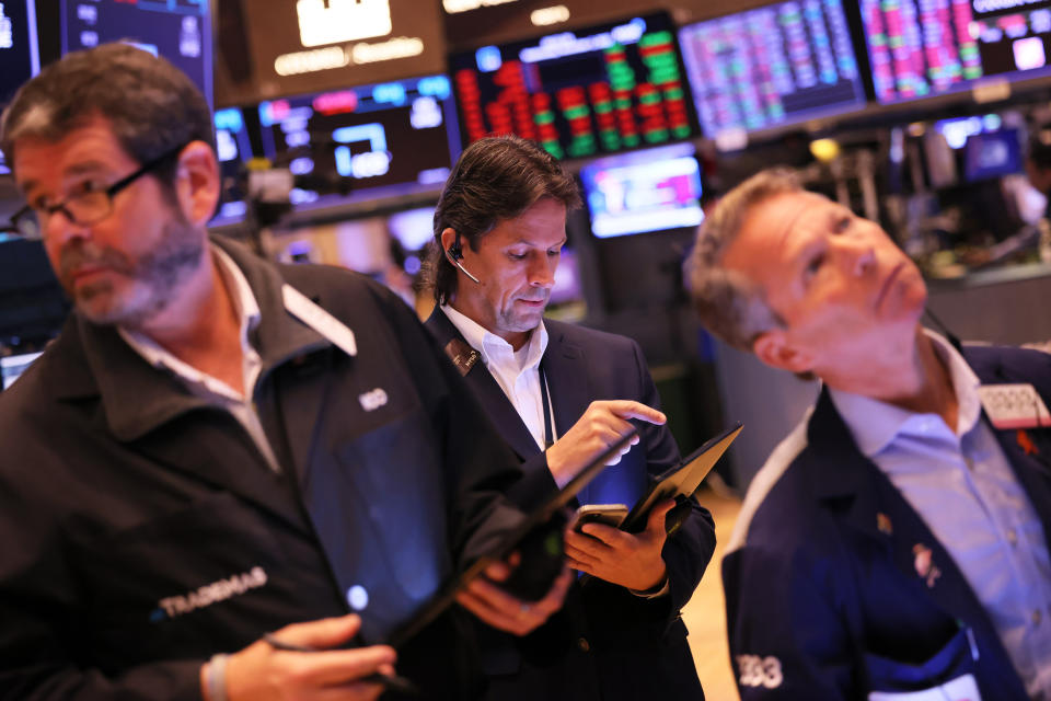 Traders work on the floor of the New York Stock Exchange during morning trading on November 02, 2022 in New York City. (Photo by Michael M. Santiago/Getty Images)