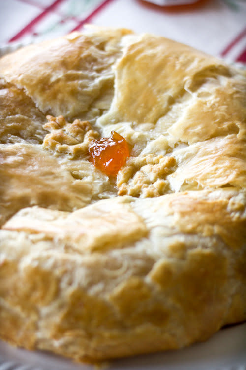 <strong>Get the <a href="http://www.adventures-in-cooking.com/2011/12/baked-brie.html" target="_blank">Baked Brie In Puff Pastry Crust With An Apricot Brown Sugar Filling recipe</a> from Adventures In Cooking</strong>