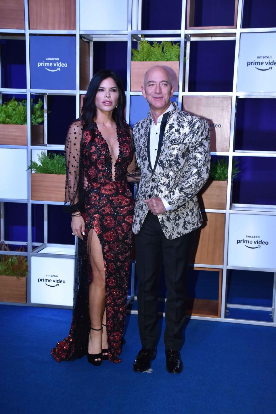 Amazon founder and CEO Jeff Bezos has been rubbing shoulders with some of India’s top entertainers during a trip to the country this week. Bezos and his girlfriend, Lauren Sanchez, posed for photos at a blue carpet event in Mumbai organized by Amazon Prime Video on Thursday. 17 Jan 2020 Pictured: Jeff Bezos and Lauren Silverman. Photo credit: Varinder Chawla / MEGA TheMegaAgency.com +1 888 505 6342 (Mega Agency TagID: MEGA587009_002.jpg) [Photo via Mega Agency]