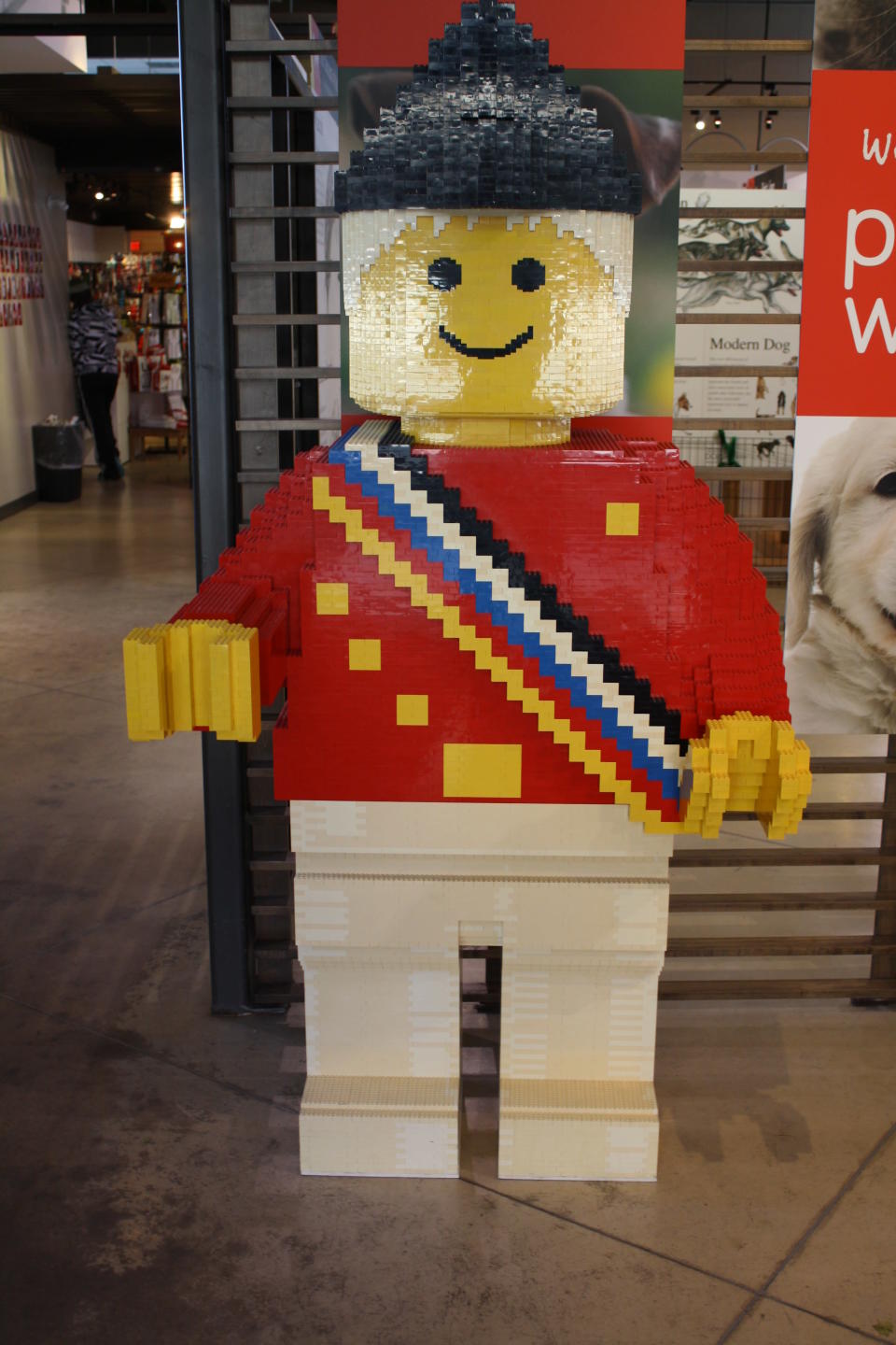 A giant LEGOMAN built out of LEGO is displayed near the competition.