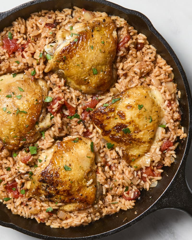 overhead shot of one pan italian chicken and rice in a cast iron pan