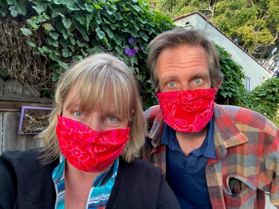 Reporter Tom Kisken and Lisa McKinnon, his wife, pose in their backyard early in the pandemic.