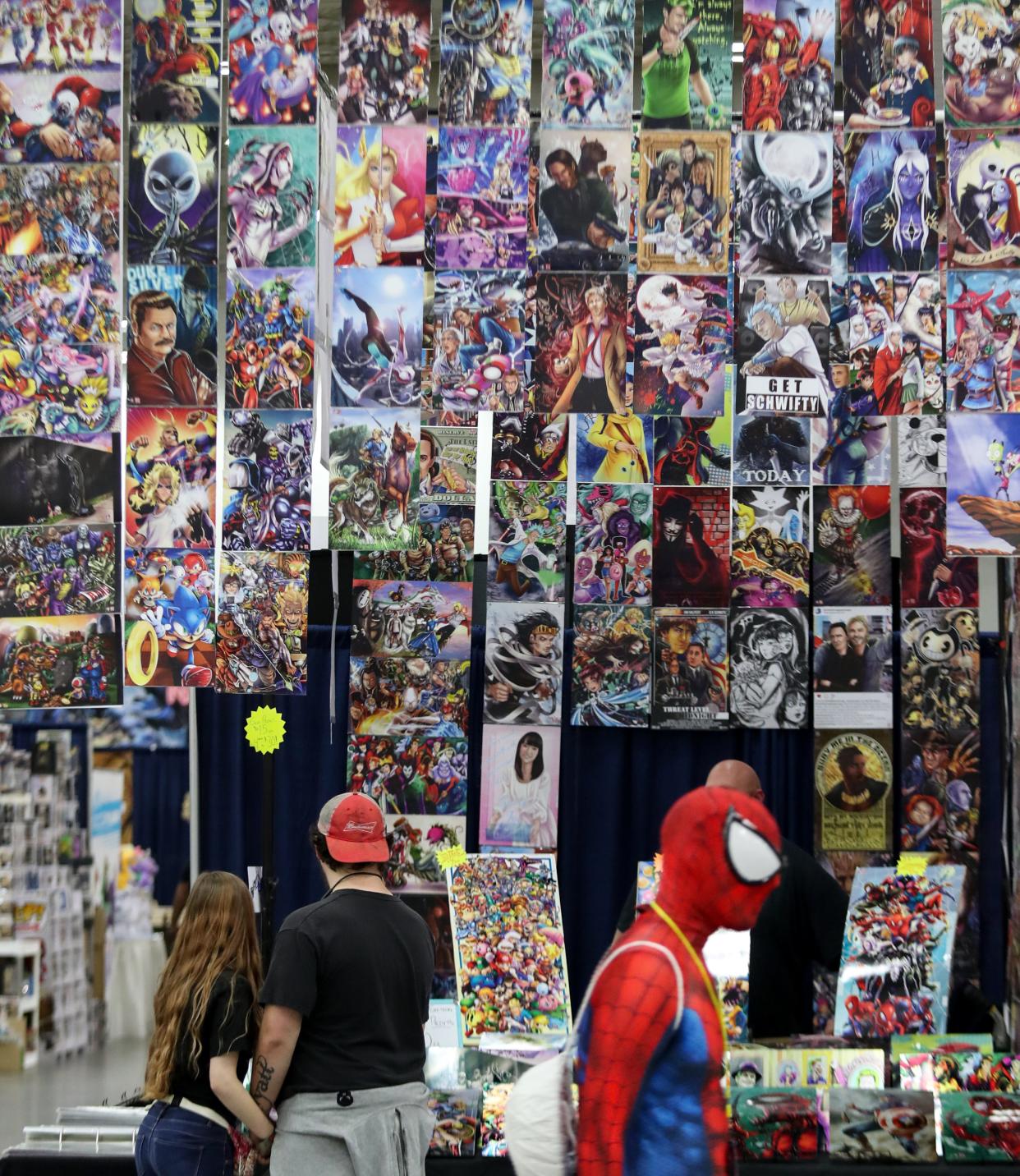 Musetap  Studios sell art prints during the first day of GalaxyCon Louisville on Nov. 22, 2019