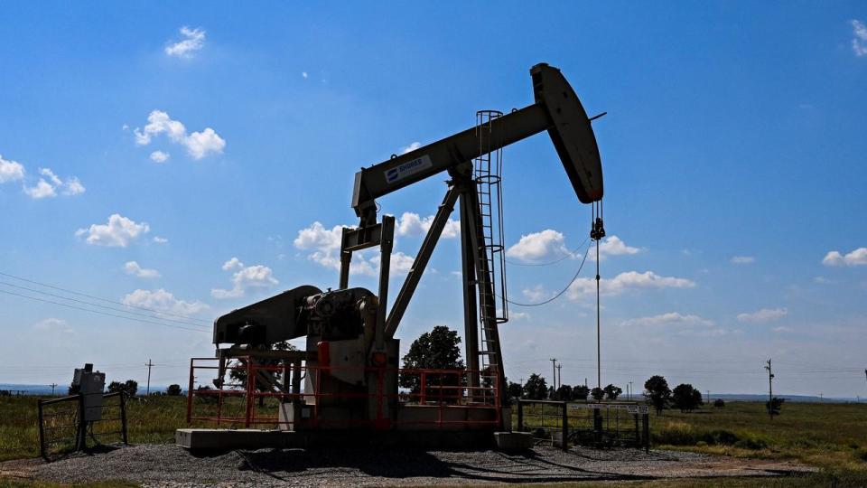 Analysts fear that global oil prices could rebound past $US100 a barrel. Photo by CHANDAN KHANNA / AFP