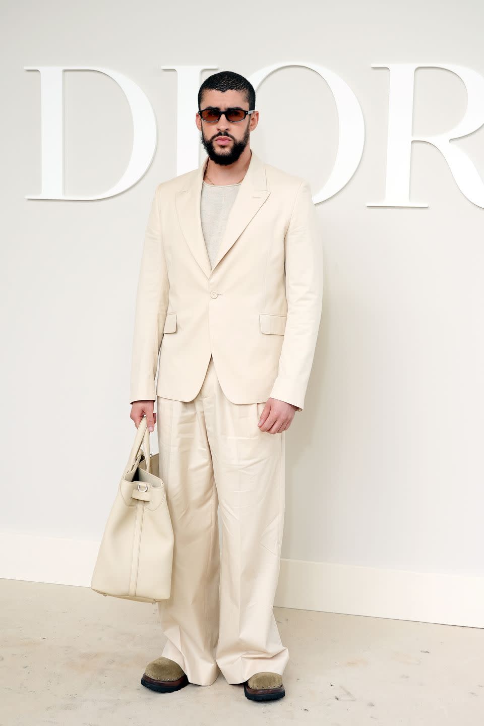 paris, france june 21 editorial use only for non editorial use please seek approval from fashion house bad bunny attends the dior homme menswear springsummer 2025 show as part of paris fashion week on june 21, 2024 in paris, france photo by francois durandgetty images