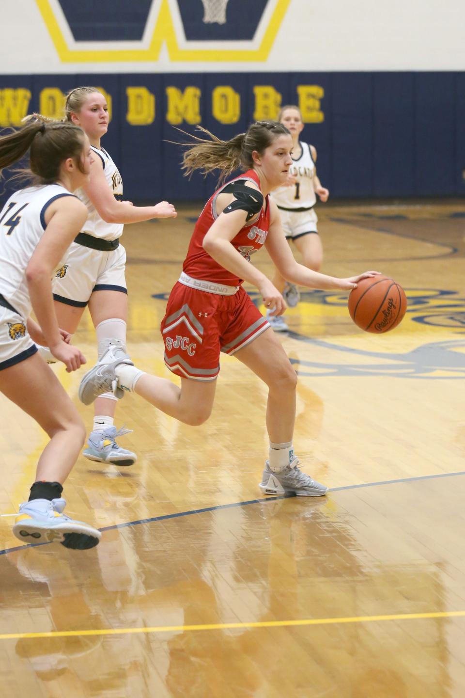 SJCC's Emma Kelbley handles the ball.