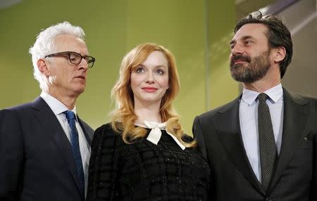 "Mad Men" stars (L-R) John Slattery, Christina Hendricks and Jon Hamm take part in a donation ceremony at the Smithsonian National Museum of American History in Washington March 27, 2015. REUTERS/Kevin Lamarque