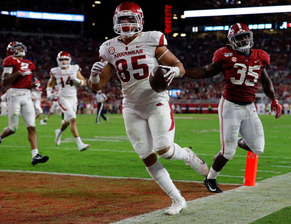 TUSCALOOSA, ALABAMA – OCTOBER 26: Cheyenne O’Grady #85 of the Arkansas Razorbacks takes this reception in for a touchdown past <a class="link " href="https://sports.yahoo.com/ncaaf/players/299010" data-i13n="sec:content-canvas;subsec:anchor_text;elm:context_link" data-ylk="slk:Shane Lee;sec:content-canvas;subsec:anchor_text;elm:context_link;itc:0">Shane Lee</a> #35 of the Alabama Crimson Tide in the second half at Bryant-Denny Stadium on October 26, 2019 in Tuscaloosa, Alabama. (Photo by Kevin C. Cox/Getty Images)