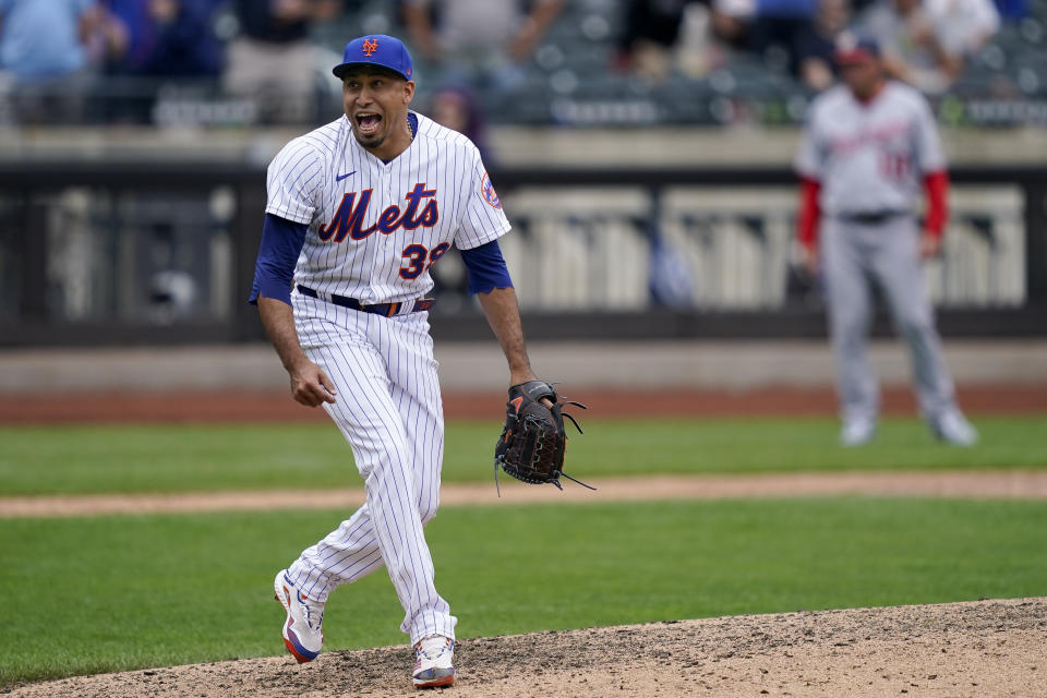 New York Mets relief pitcher Edwin Diaz (39) reacts after closing the ninth inning of a baseball game against the Washington Nationals, Wednesday, June 1, 2022, in New York. (AP Photo/John Minchillo)