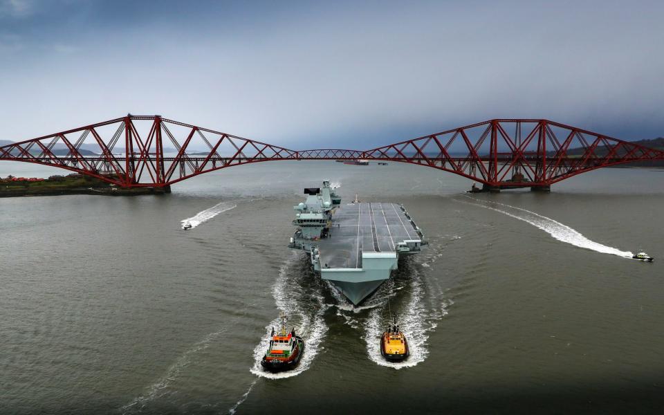 MS Queen Elizabeth has sailed under the Forth bridges once more, as she returns to her birth place for a scheduled period of maintenance -  Royal Navy
