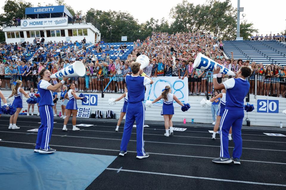 Olentangy Liberty fans cheer during a home game against Pickerington Central on Aug. 18.