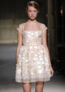 <b>Georges Hobieka SS13<br></b><br>We felt transported back to the 60's with this pearlescent, sequin number.<b><br><br></b>© Rex