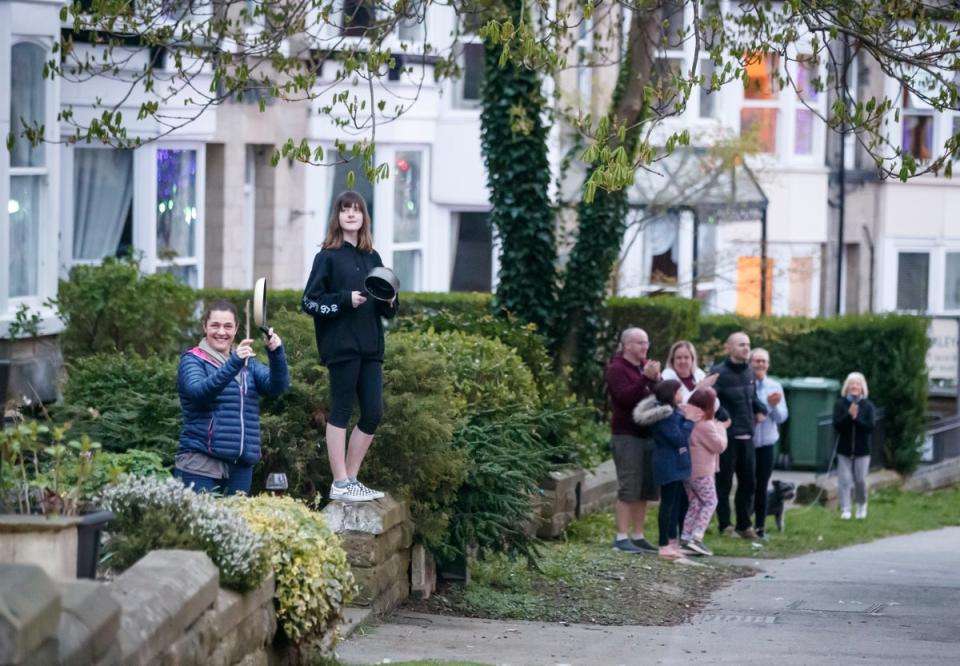 Local residents clapping outside the Nightingale Hospital at the Harrogate Convention Centre in April 2020 (PA) (PA Archive)