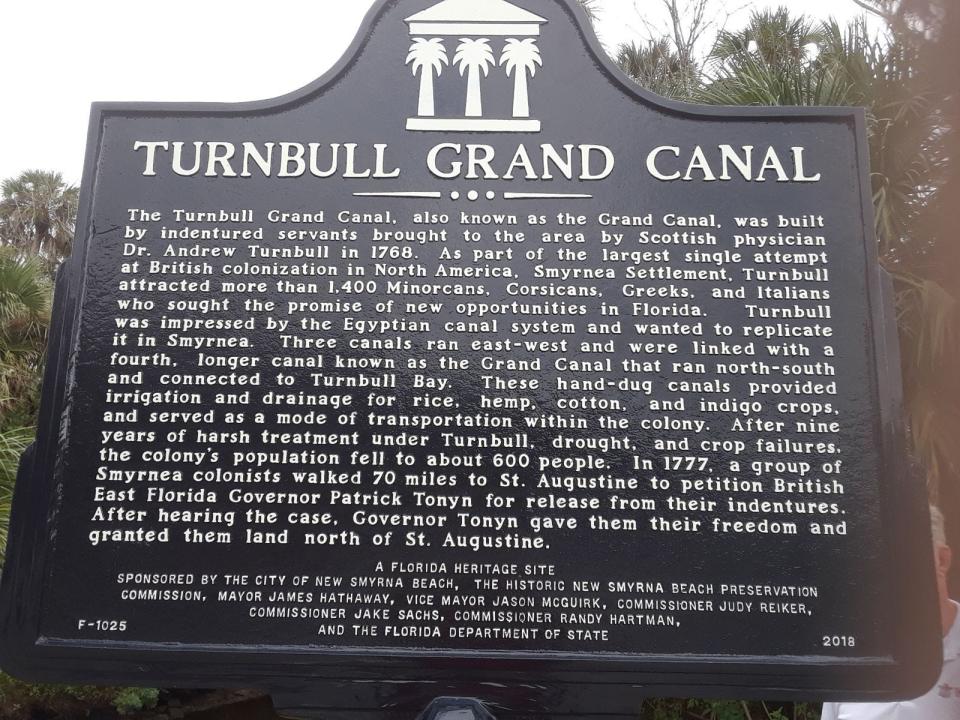 Sign in New Smyrna Beach describes part of the history behind the Turnbull Canal in the city.