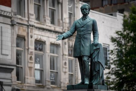 A monument to former U.S. Vice President and Confederate General John Cabell Breckinridge stands outside the Old Courthouse in Lexington, Ky., U.S., August 15, 2017. REUTERS/Bryan Woolston