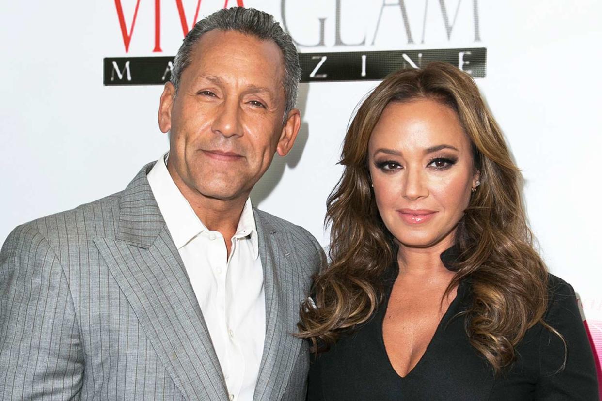 <p>Vincent Sandoval/WireImage</p> From left:Angelo Pagan and Leah Remini attend the launch of VIVA GLAM Magazine