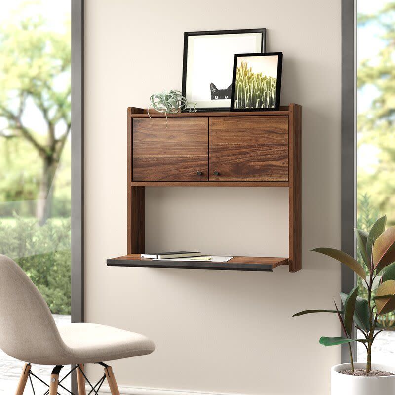 <p><a href="https://go.redirectingat.com?id=74968X1596630&url=https%3A%2F%2Fwww.wayfair.com%2F--%2Fpdp%2Funion-rustic--jolita-floating-desk-x117222128-l32-w006111017.html&sref=https%3A%2F%2Fwww.housebeautiful.com%2Fshopping%2Fbest-stores%2Fa60591461%2Fwayfair-opening-store-details%2F" rel="nofollow noopener" target="_blank" data-ylk="slk:Shop Now;elm:context_link;itc:0;sec:content-canvas" class="link rapid-noclick-resp">Shop Now</a></p><p>Jolita Floating Desk</p><p>wayfair.com</p><p>$165.99</p>