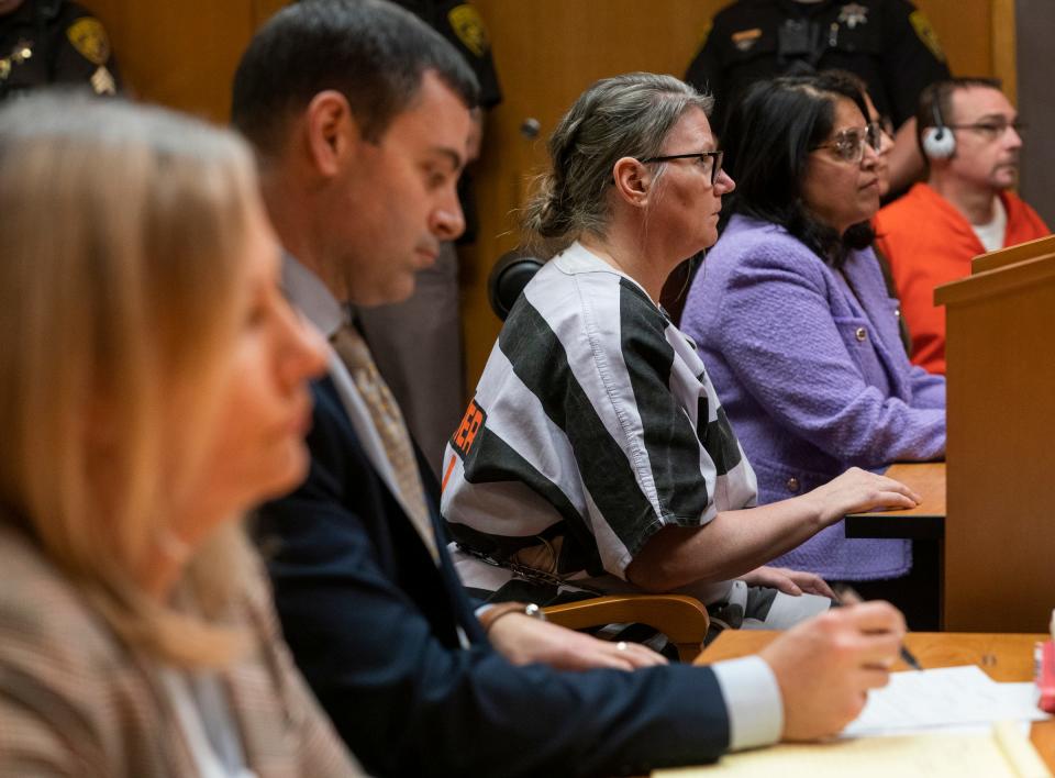 Oakland County prosecutor Karen McDonald, left, assistant prosecuting attorney Marc Keast, Jennifer Crumbley, attorney Anjali Prasad (a stand-in for Shannon Smith), attorney Mariell Lehman and James Crumbley sit in the Oakland County Courtroom of Judge Cheryl Matthews on Wednesday, Dec. 13, 2023, for a procedural matter regarding conflict of interest.