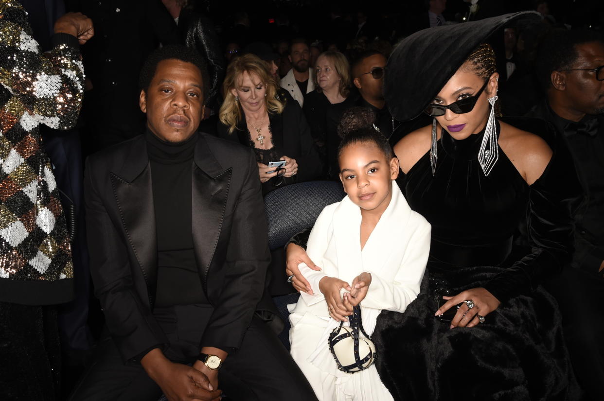 Jay-Z, pictured with daughter Blue Ivy and wife Beyonce learned how to swim when he became a father. (Photo: Michele Crowe/CBS via Getty Images)