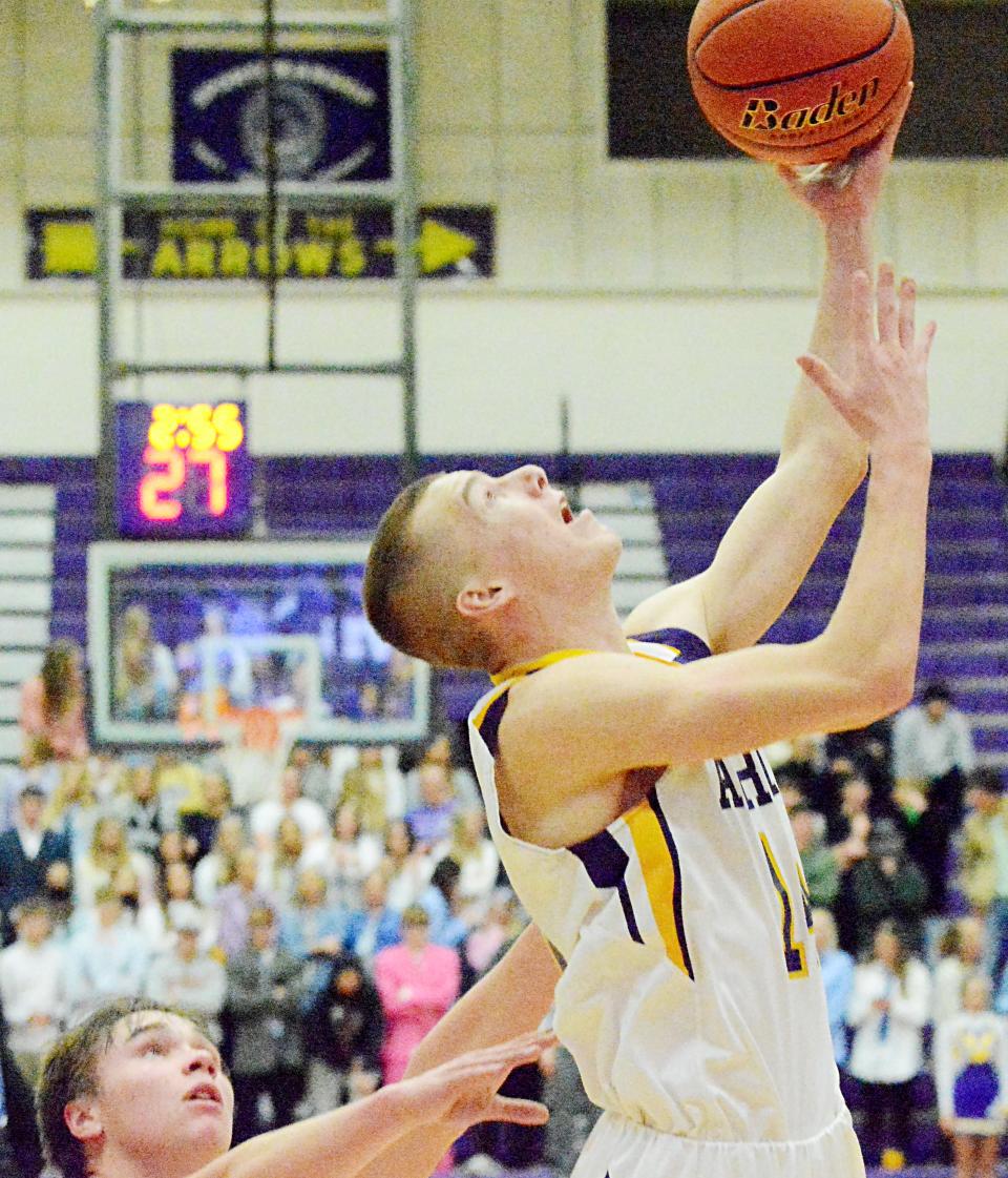 Watertown's Kohen Kranz scores against Sioux Falls Christian's Tayton Snyder during their high school boys basketball game Saturday night in the Civic Arena. Sioux Falls Christian won 64-52.