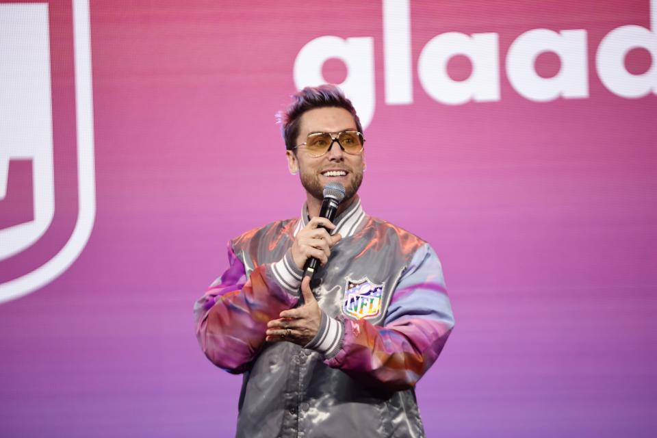 Lance Bass speaks on stage at a 'Night Of Pride With GLAAD and NFL' at Caesars Palace on Feb. 7, 2024, in Las Vegas. The singer provided safety tips to fans ahead of the April 8 solar eclipse.