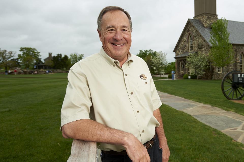 Golf: Bass Pro Shops Legends of Golf: Portrait of Bass Pro Shops owner John L. Morris posing in front of wedding chapel on Top of the Rock course on Sunday at Big Cedar Lodge. Legends and Champions Tour.