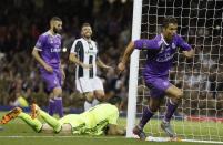<p>Real Madrid’s Cristiano Ronaldo celebrates after scoring during the Champions League final soccer match between Juventus and Real Madrid at the Millennium Stadium in Cardiff, Wales </p>