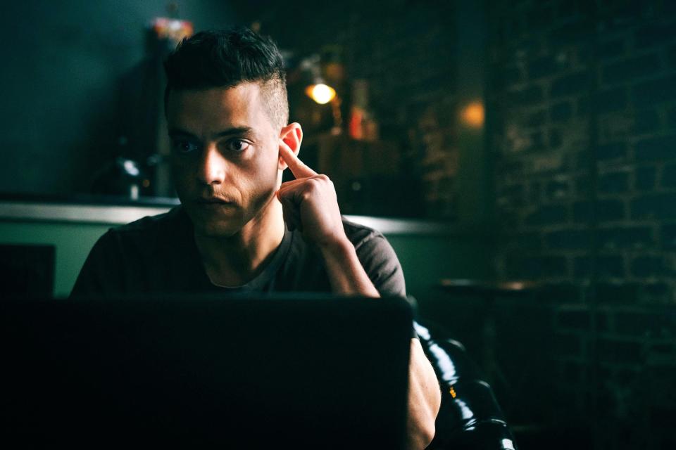 Rami Malek looking thoughtful