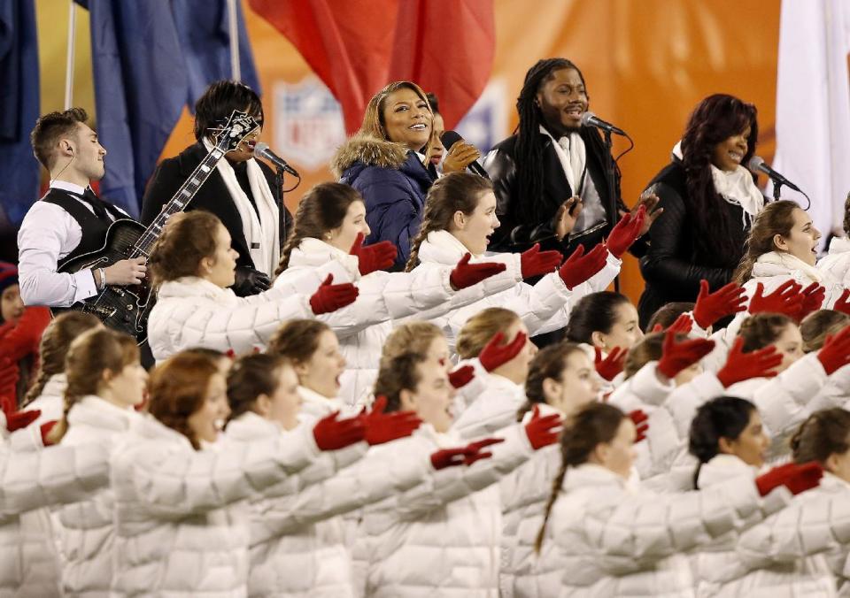 Queen Latifah sings "America the Beautiful" before the NFL Super Bowl XLVIII football game between the Seattle Seahawks and the Denver Broncos Sunday, Feb. 2, 2014, in East Rutherford, N.J. (AP Photo/Kathy Willens)
