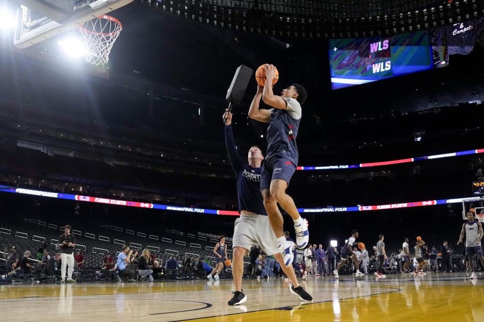 Florida Atlantic guard Bryan Greenlee practices for their Final Four college basketball game in the NCAA Tournament on Friday, March 31, 2023, in Houston. San Diego State and Florida Atlantic play on Saturday. (AP Photo/David J. Phillip)