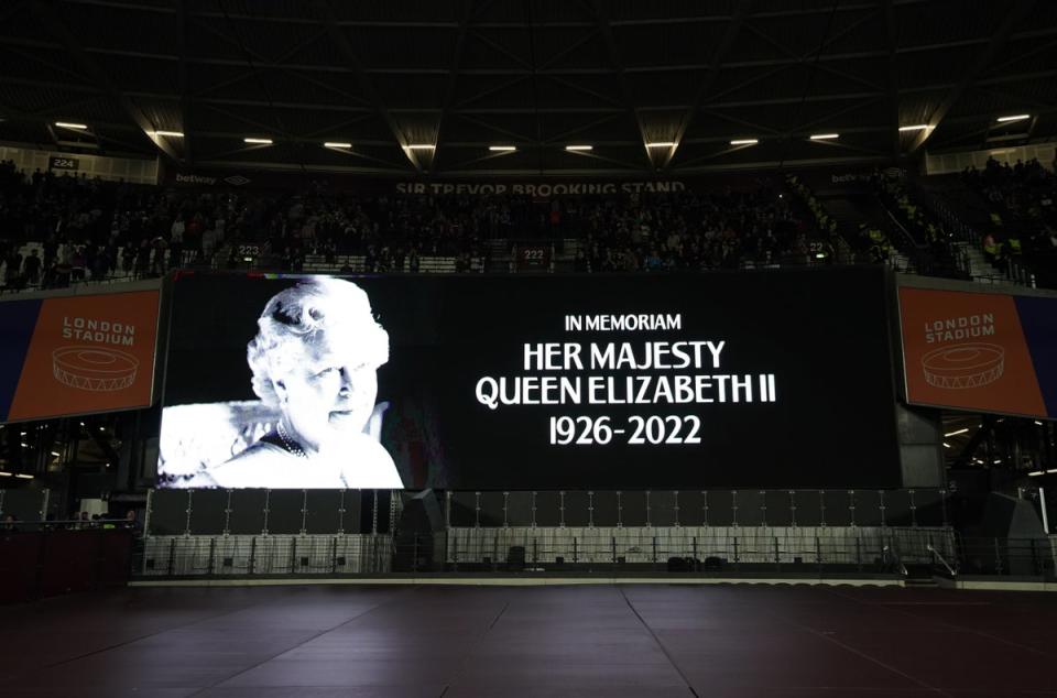 The big screen displays a message in memoriam following the announcement of the death of Queen Elizabeth II (Zac Goodwin/PA) (PA Wire)