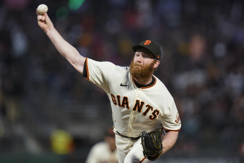 San Francisco Giants' John Brebbia pitches against the Milwaukee Brewers during the sixth inning of a baseball game in San Francisco, Thursday, July 14, 2022. (AP Photo/Godofredo A. Vásquez)