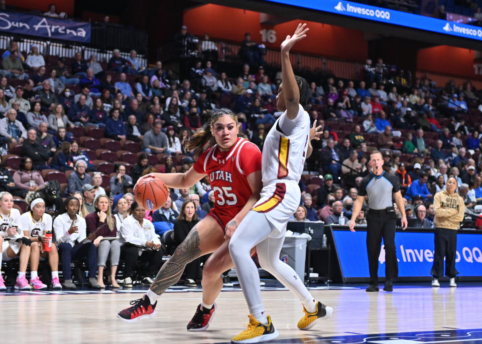 Utah forward Alissa Pili drives to the basket while South Carolina forward Ashlyn Watkins defends during the Women's Hall of Fame Showcase at the Mohegan Sun Arena in Uncasville, Connecticut, on Dec. 10, 2023. (Photo by Williams Paul/Icon Sportswire via Getty Images)