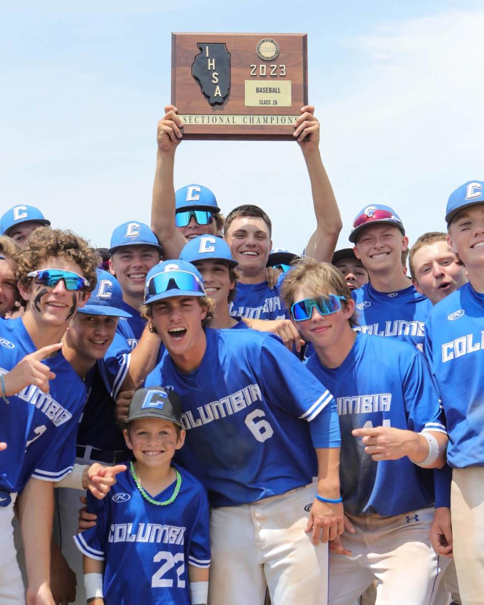 Columbia’s Dominic Voegele celebrates with teammates after defeating Father McGivney 6-3 in the IHSA Class 2A sectional championship game. Voegele and the Eagles then defeated Nashville in the Carbdonale (SIU) Super-Sectional and will play in the state semifinals at 3 p.m. Friday, June 2, at Dozer Park in Peoria.