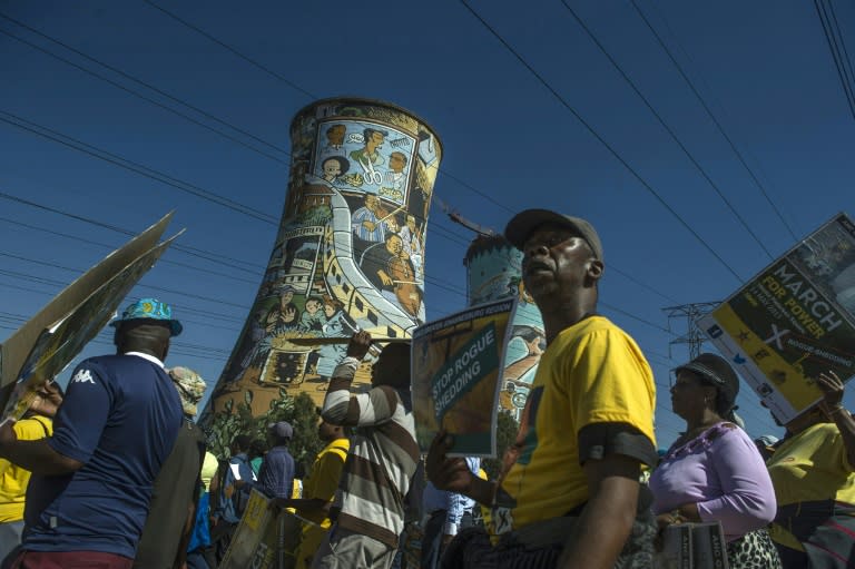 Supporters from South Africa's ruling party the ANC marched against power supplier Eskom in May to protest against power cuts in Soweto, Johannesburg