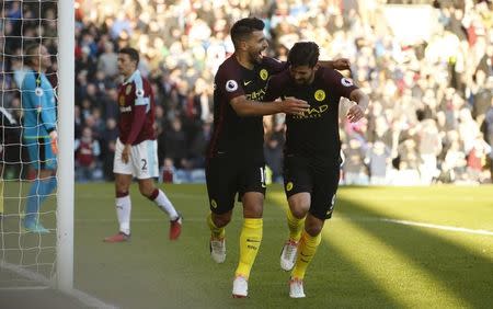 Football Soccer Britain - Burnley v Manchester City - Premier League - Turf Moor - 26/11/16 Manchester City's Sergio Aguero celebrates scoring their second goal with Nolito Reuters / Andrew Yates Livepic