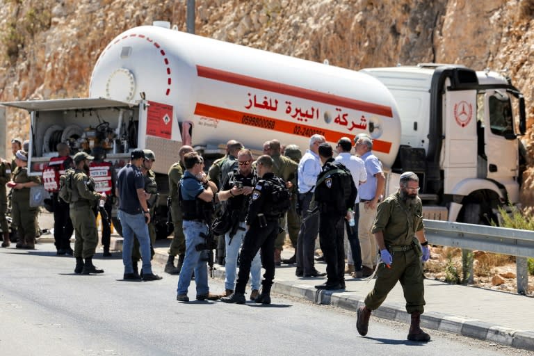 Israeli forces at the scene of a suspected ramming attack near Ramallah in the occupied West Bank (Ahmad GHARABLI)