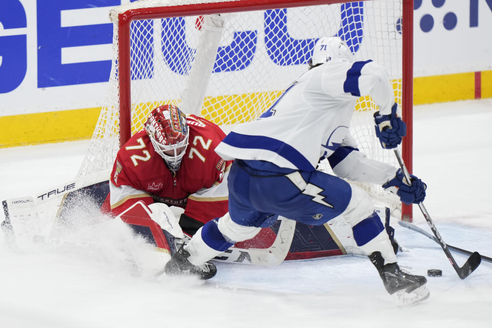 Tampa Bay Lightning center Anthony Cirelli (71) attempts a shot at Florida Panthers goaltender Sergei Bobrovsky (72) during the second period of Game 2 of the first-round of an NHL Stanley Cup Playoff series, Tuesday, April 23, 2024, in Sunrise, Fla. (AP Photo/Wilfredo Lee)