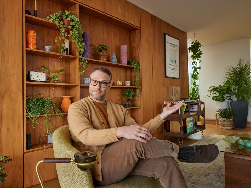 A nearly $300 standing ashtray from Houseplant in front of Rogen's chair