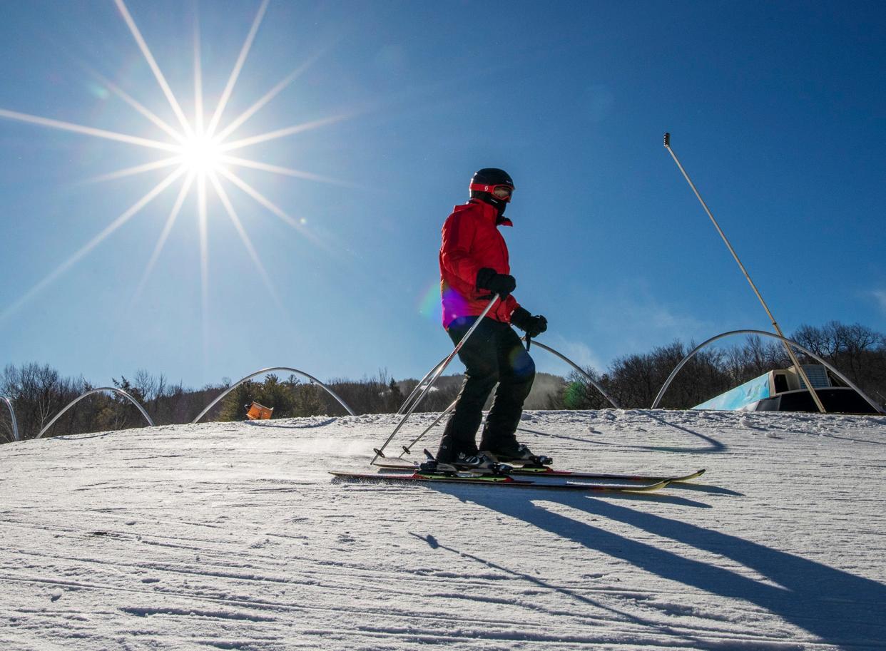 The sun is shining on a cold and windy day at Wachusett Mountain Ski Area last February.