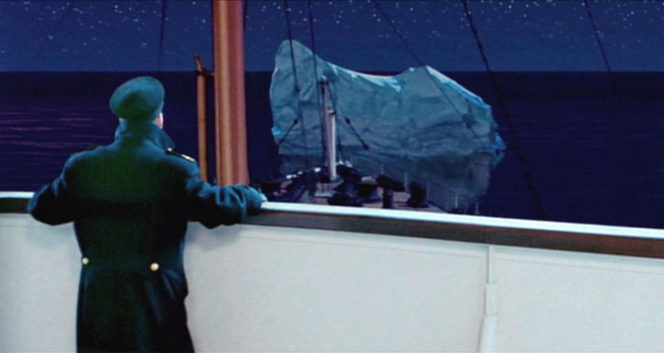 Murdoch looking at the iceberg