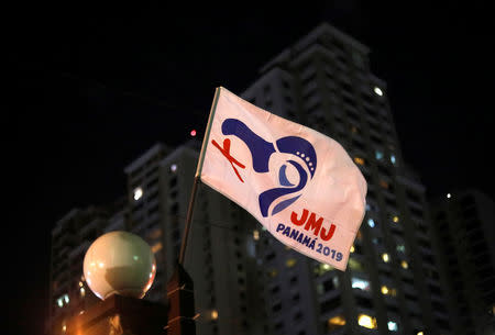 A flag with the logo of World Youth Day waves outside a church in Panama City, ahead of Pope Francis' visit for World Youth Day in Panama City, Panama January 21, 2019. REUTERS/Henry Romero