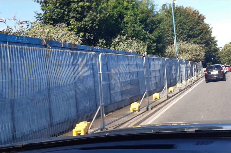 Medway Council has splashed out £50,000 on the hoardings to protect a footpath since the retaining wall was deemed a health and safety risk in 2009. (SWNS)