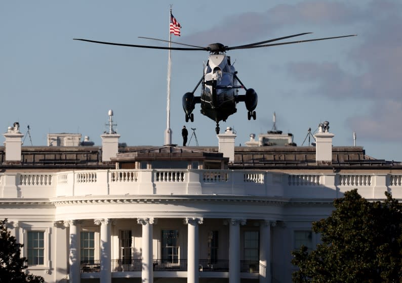 WASHINGTON, DC - OCTOBER 02: Marine One, the presidential helicopter, arrives at the White House to carry U.S. President Donald Trump to Walter Reed National Military Medical Center October 2, 2020 in Washington, DC. Trump announced earlier today via Twitter that he and U.S. first lady Melania Trump have tested positive for coronavirus. (Photo by Win McNamee/Getty Images)