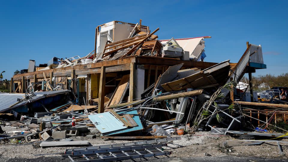 A house sits in ruin in September 2022 following Category 4 Hurricane Ian in Fort Myers, Florida. - Eva Marie Uzcategui/Bloomberg/Getty Images