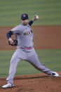 Milwaukee Brewers starting pitcher Brett Anderson throws during the first inning of a baseball game against the Miami Marlins, Sunday, May 9, 2021, in Miami. (AP Photo/Marta Lavandier)