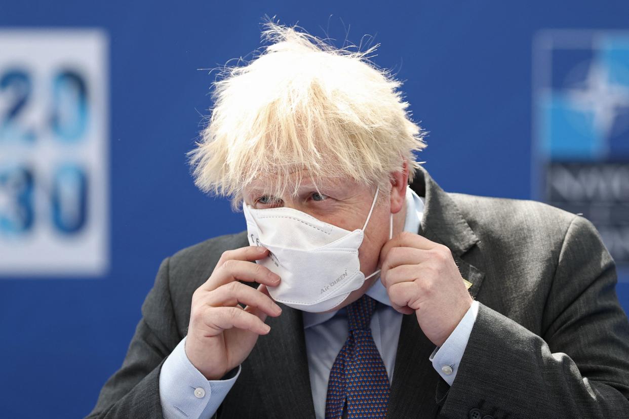 British Prime Minister Boris Johnson arrives to attend the NATO summit at the NATO headquarters in Brussels on June 14, 2021. - The allies meet to agree a statement stressing common ground on securing their withdrawal from Afghanistan, joint responses to cyber attacks and relations with a rising China. (Photo by KENZO TRIBOUILLARD / various sources / AFP) (Photo by KENZO TRIBOUILLARD/AFP via Getty Images)