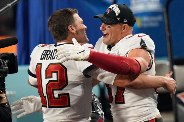 Tampa Bay Buccaneers quarterback Tom Brady and Tampa Bay Buccaneers tight end Rob Gronkowski celebrate