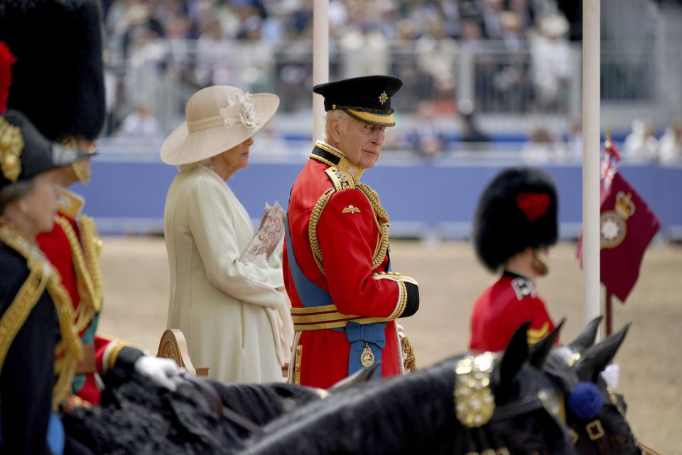 Britain's King Charles III and Queen Camilla during the Trooping the Color ceremony at Horse Guards Parade, London, Saturday, June 15, 2024. Trooping the Color is the King's Birthday Parade and one of the nation's most impressive and iconic annual events attended by almost every member of the Royal Family. (Yui Mok/PA via AP)