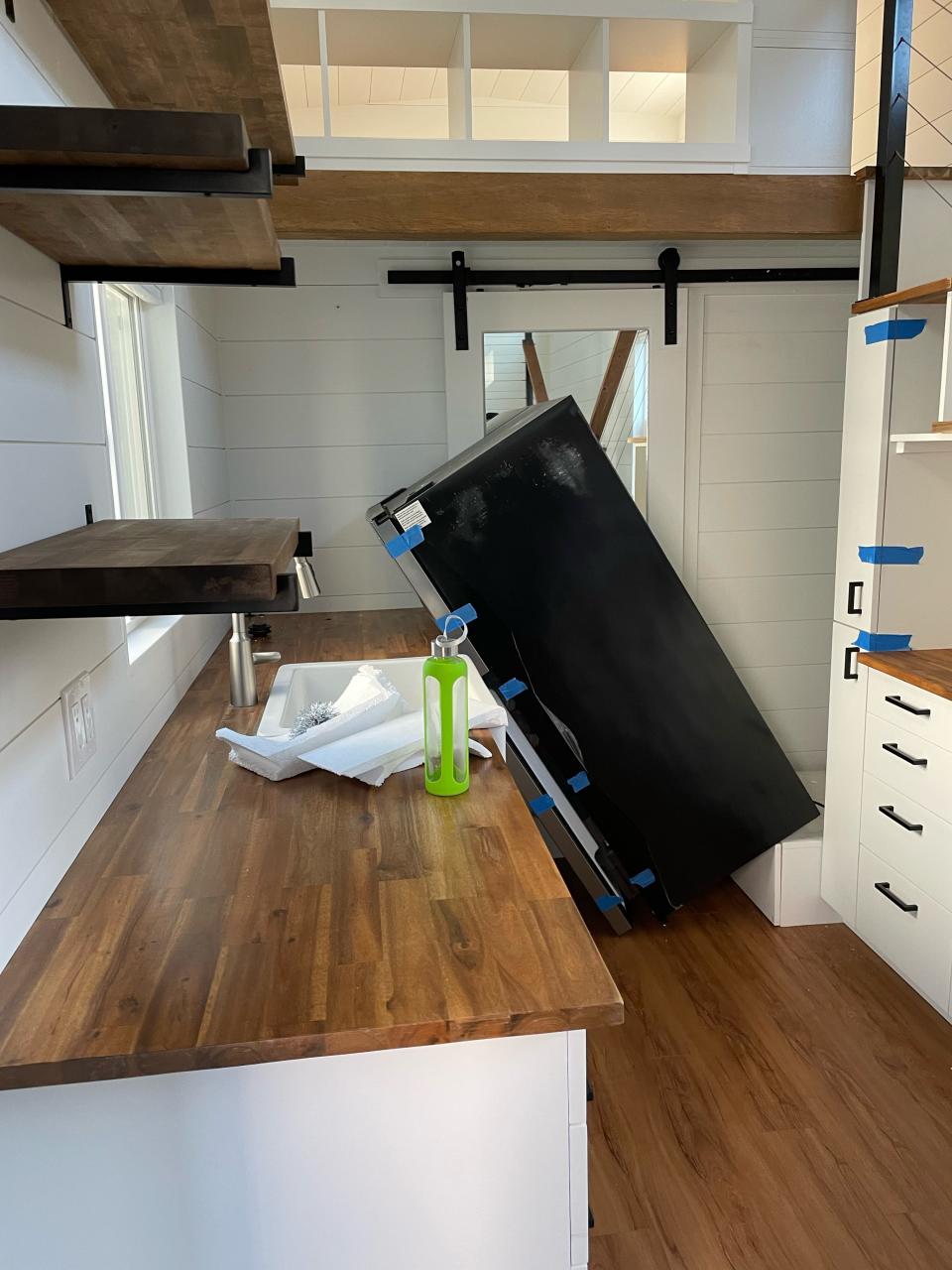 fridge tipped over into house